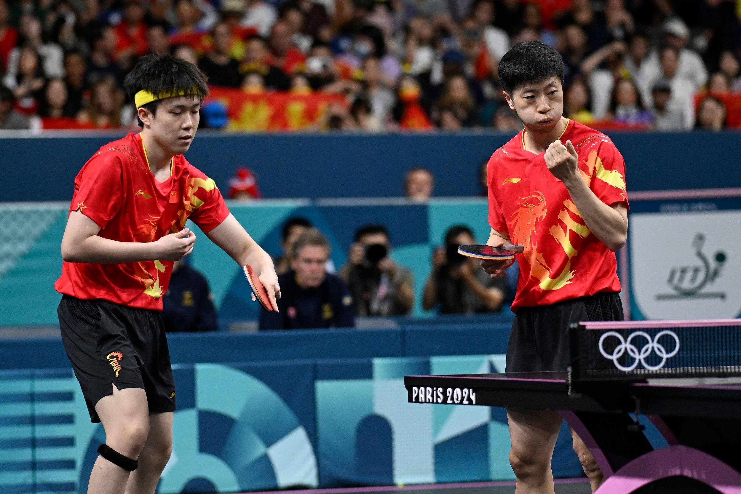 法国队鏖战日本队,马龙关键制胜 法国队鏖战日本队,马龙关键制胜